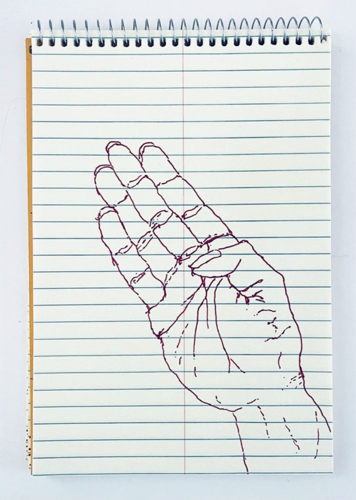 An outline handsketch of a hand shaping the ASL American manual letter “A”, in red ink on a yellow spiral bound steno notebook. 