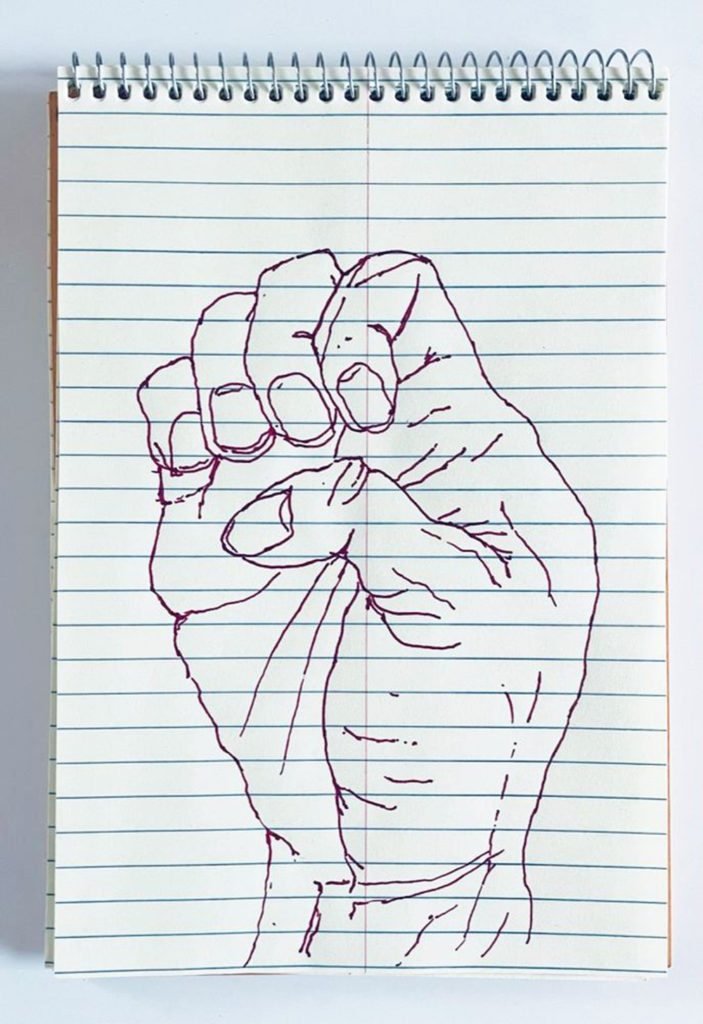 An outline handsketch of a hand shaping the ASL American manual letter “E”, in red ink on a yellow spiral bound steno notebook. 